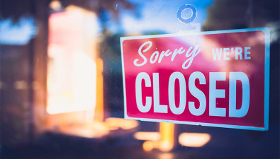 Closed Sign on Business Door