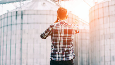 Man In Front Of Silo 1222548181